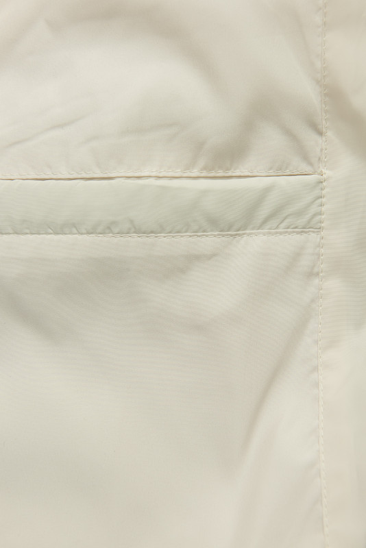 Ecru prechodná bunda s pletenými rukávmi