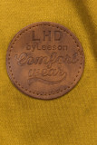 Mustard mikina s tvarovaným pásom
